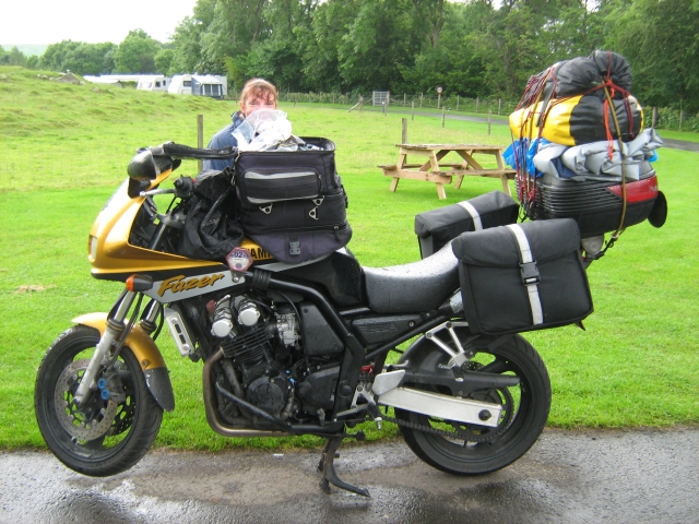 my fazer 600 over loaded with camping gear, the gf is hiding behind